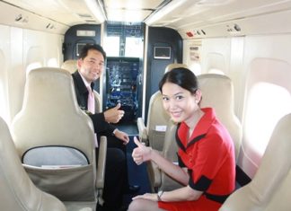 Mayor Itthiphol Kunplome checks out inside of the new Dornier 228.